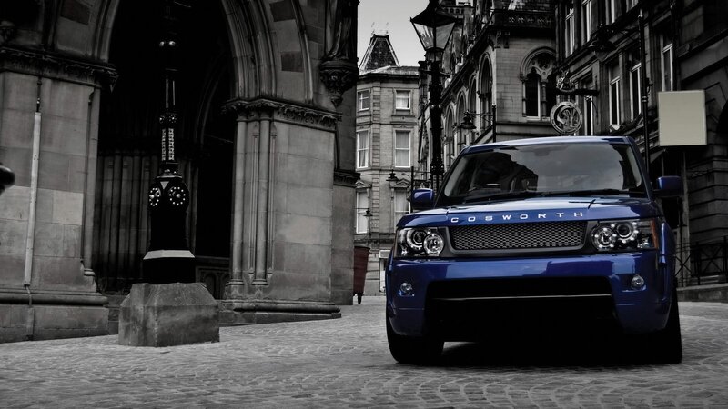 Blue SUV on Cobblestones