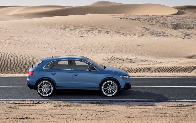 Blue SUV on Desert Road — Desolate