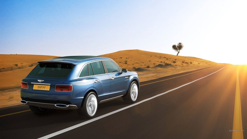 Blue SUV on Desert Road — Serene, Sunset