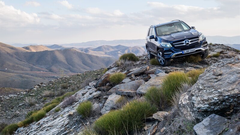 Blue Suv on Rocky Hill