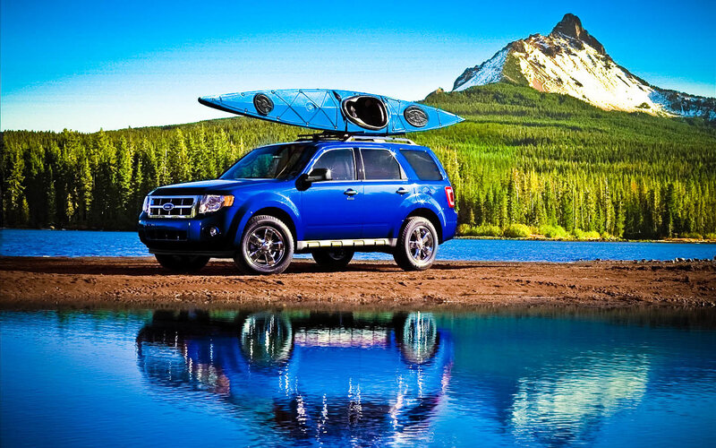 Blue Suv with Kayak