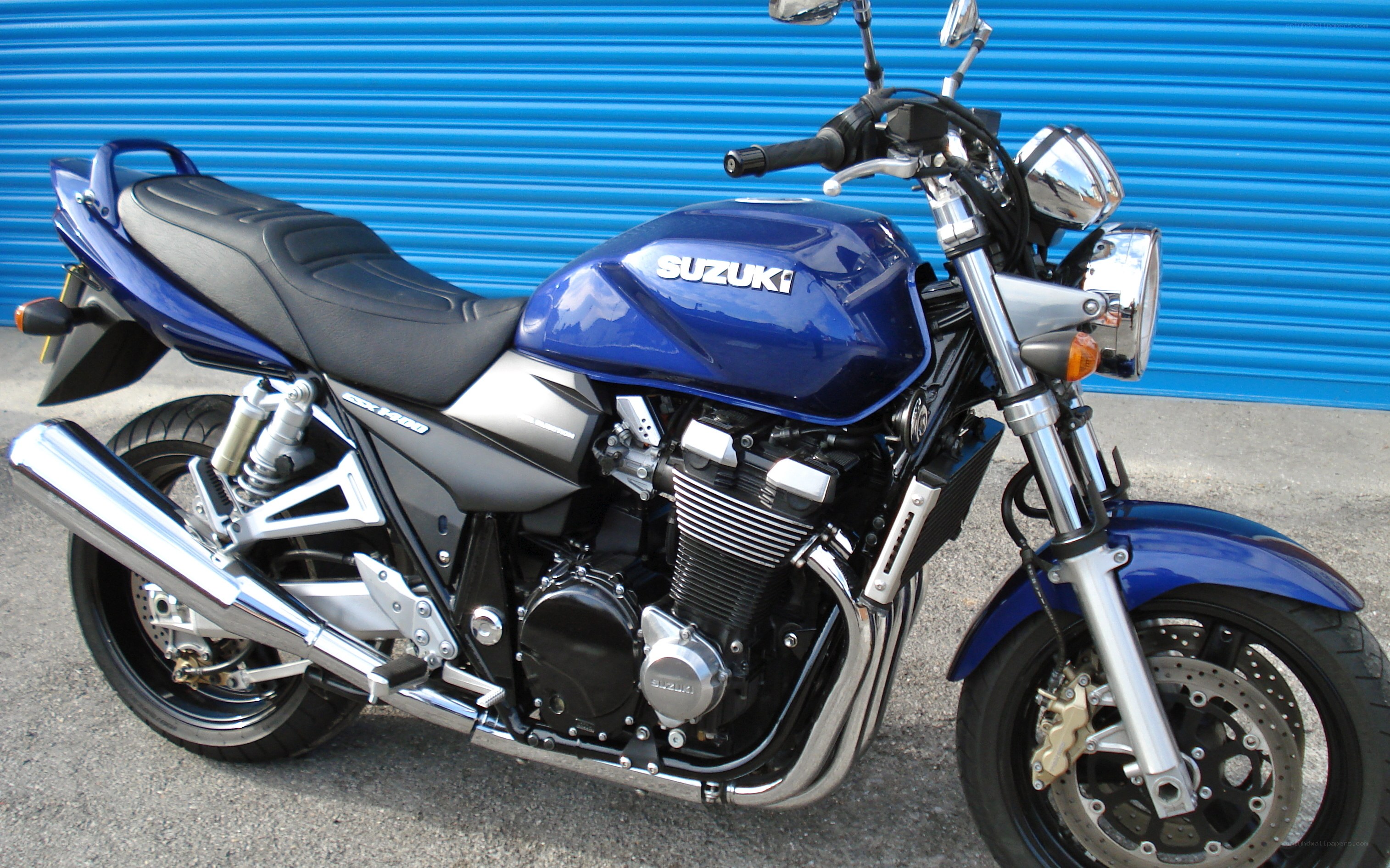 Blue Suzuki motorcycle