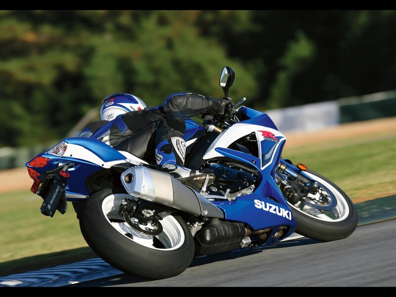 Blue Suzuki motorcycle on track