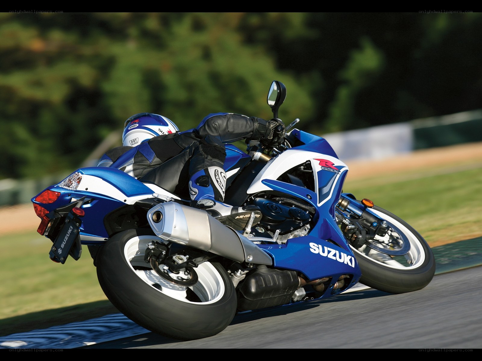 Blue Suzuki motorcycle on track