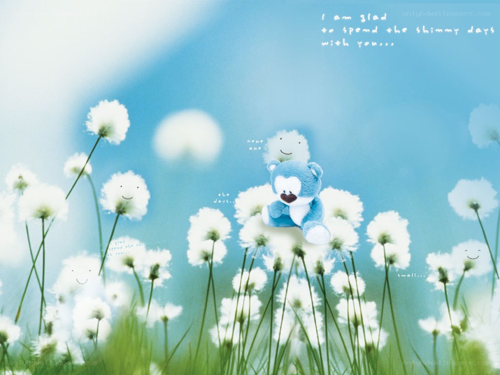Blue teddy bear in dandelion field