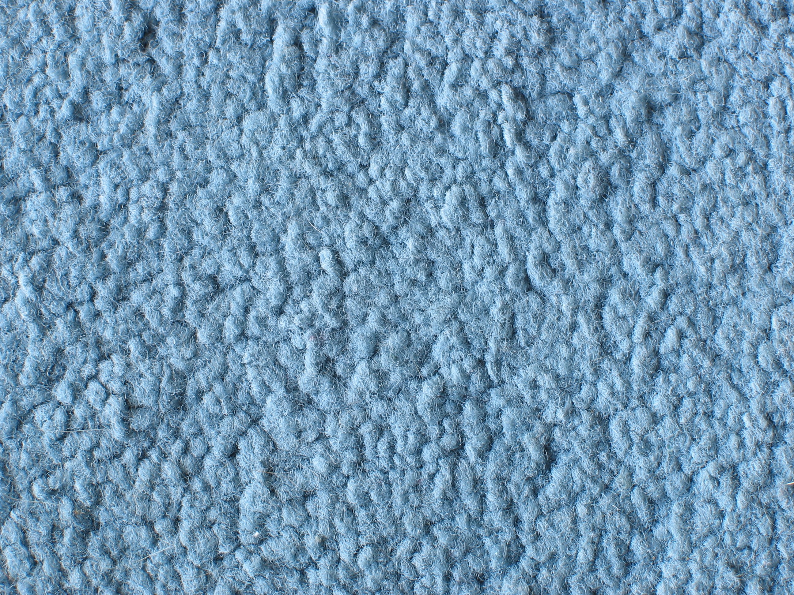 blue textured carpet surface