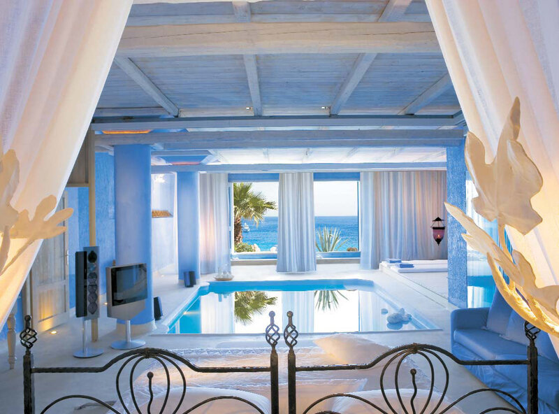 Blue-themed poolside bedroom