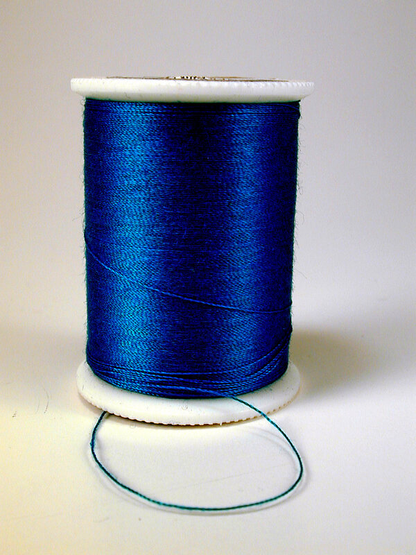 blue thread on spool