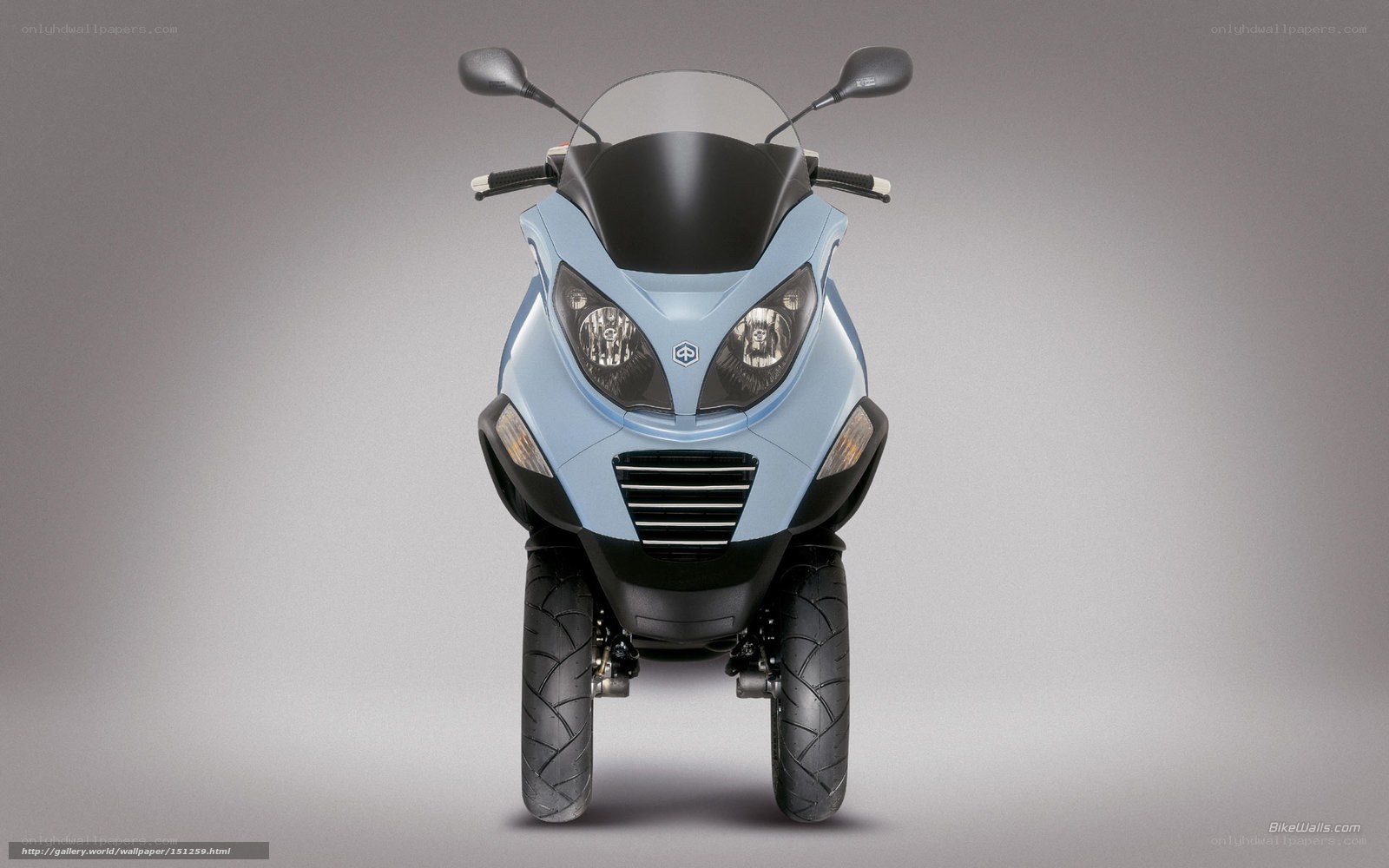 blue three-wheeled scooter