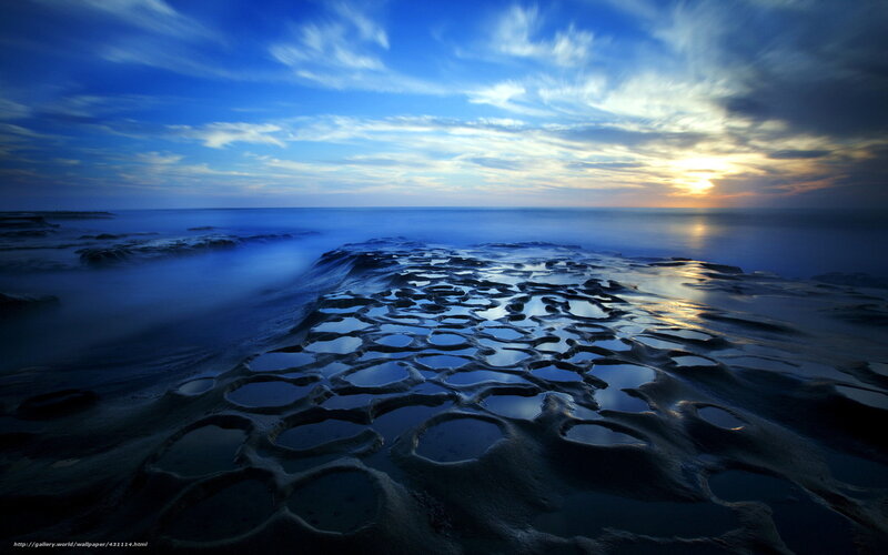 Blue tide pools at sunset