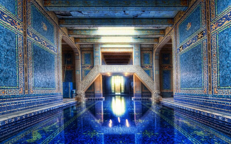 Blue-tiled indoor pool hall