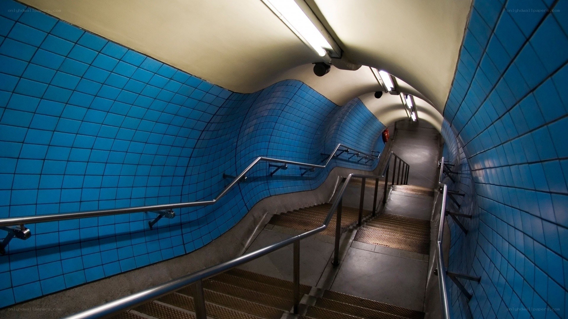 Blue-tiled subway staircase