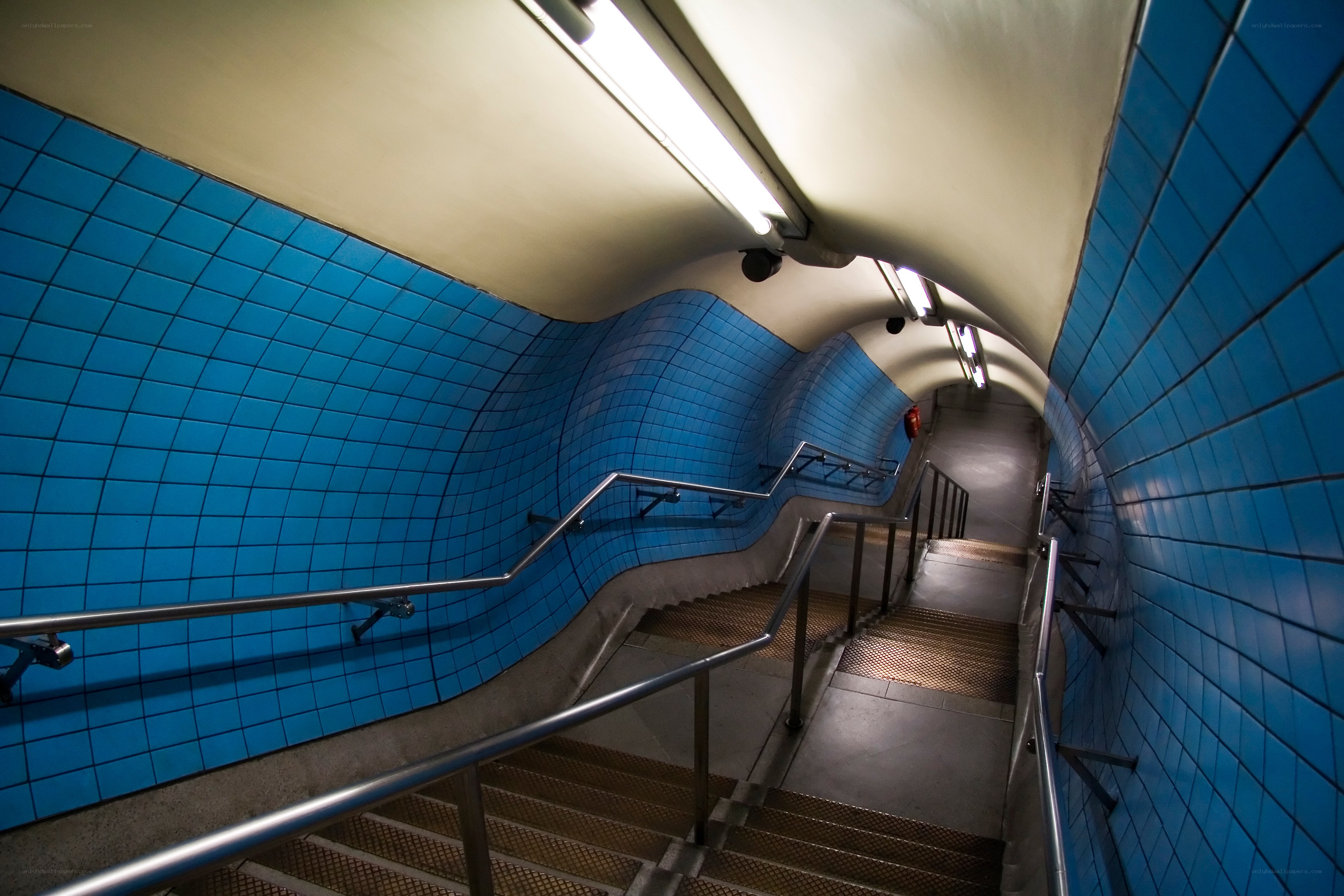 Blue-tiled subway staircase