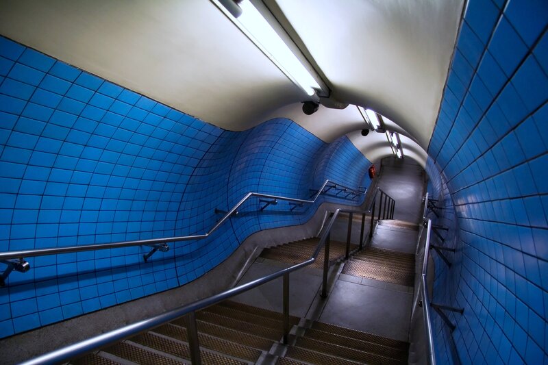 Blue-tiled subway staircase
