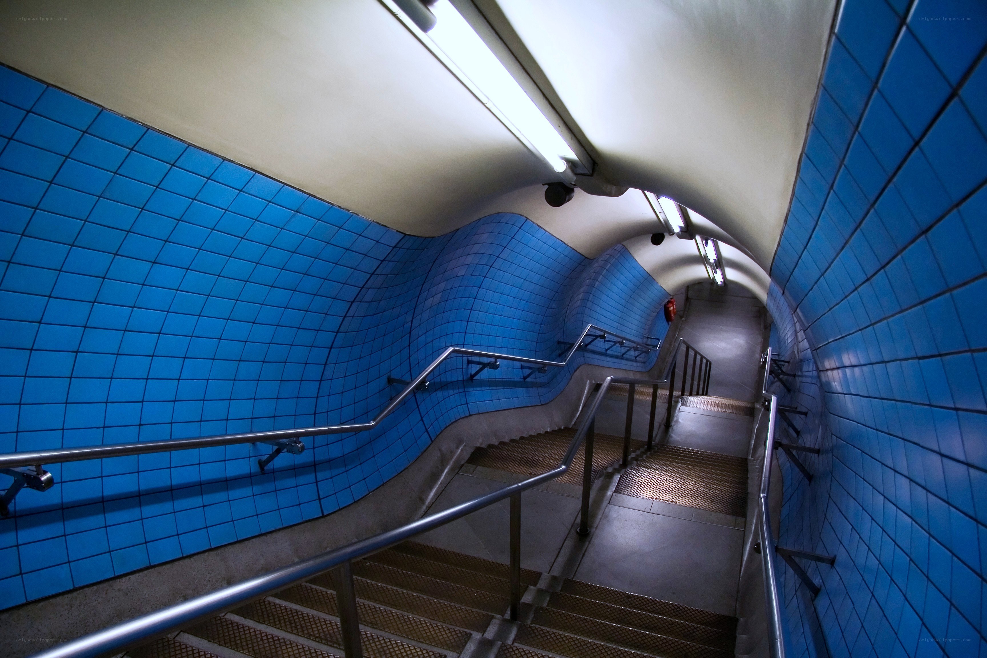 Blue-tiled subway staircase