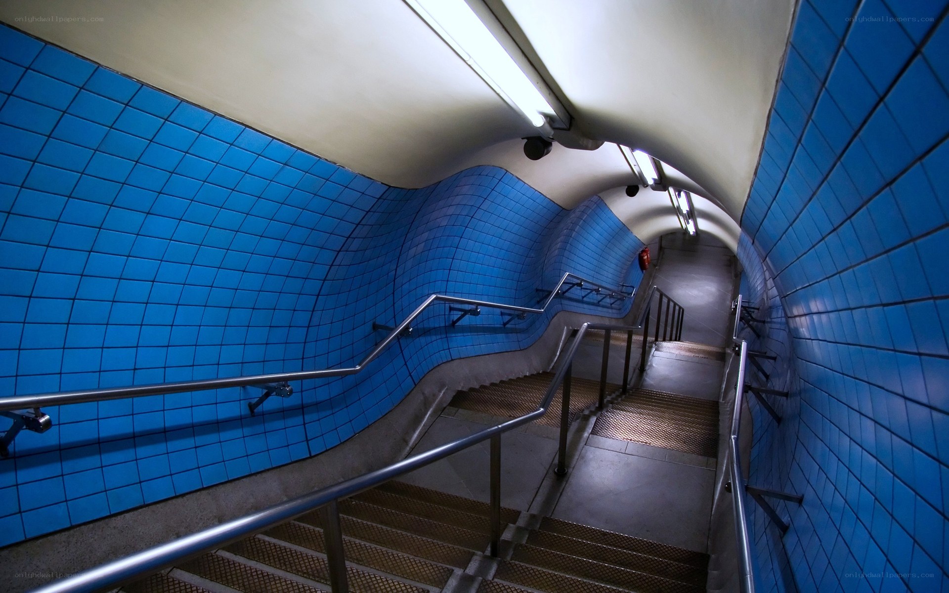 Blue-tiled subway staircase