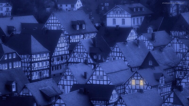 blue-tinted village rooftops