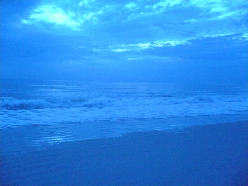 Blue-toned beach at dawn