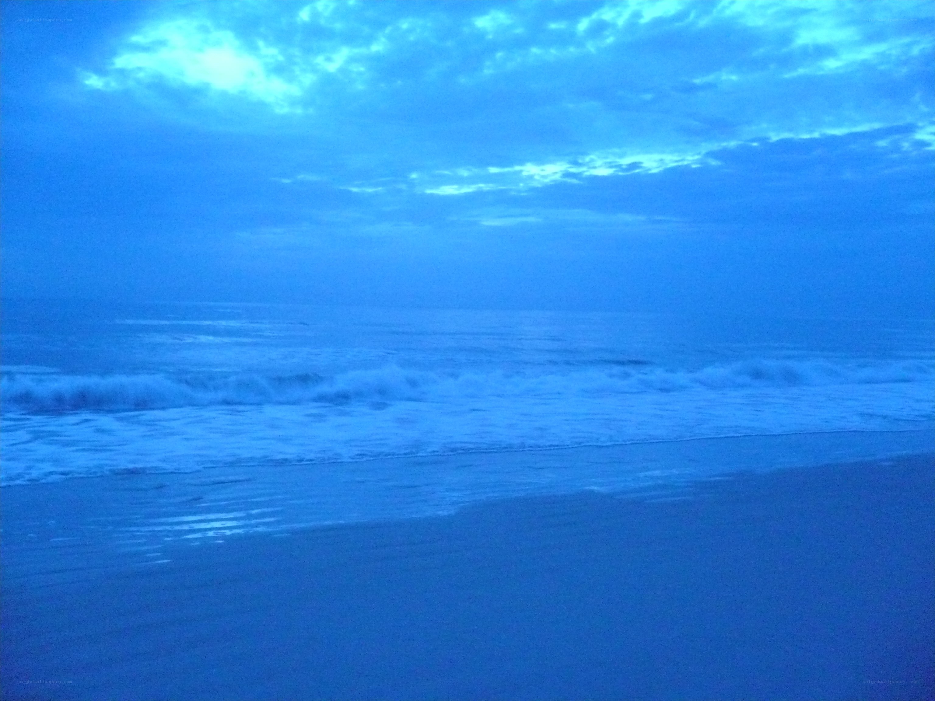 Blue-toned beach at dawn