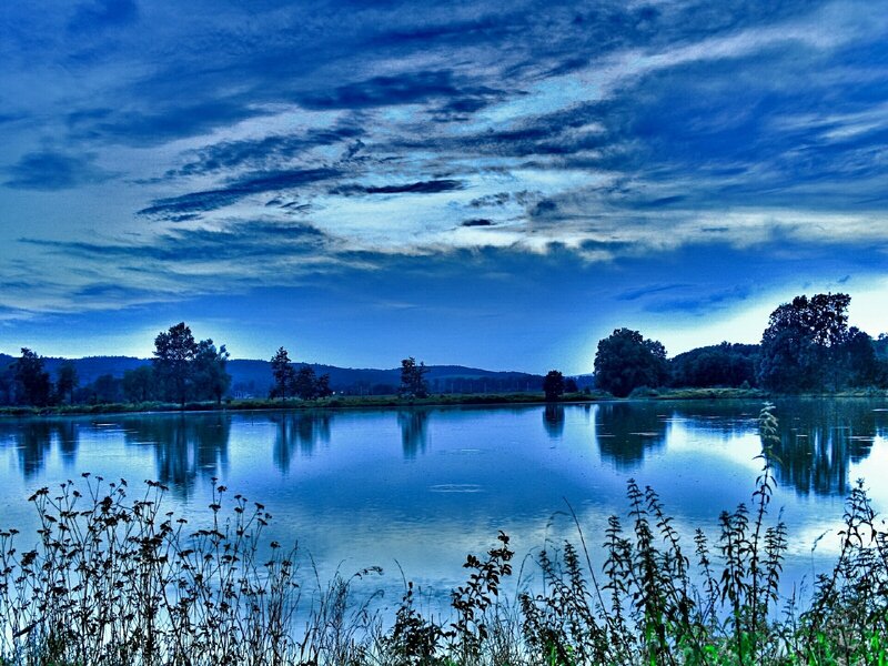 Blue-toned lake at dusk