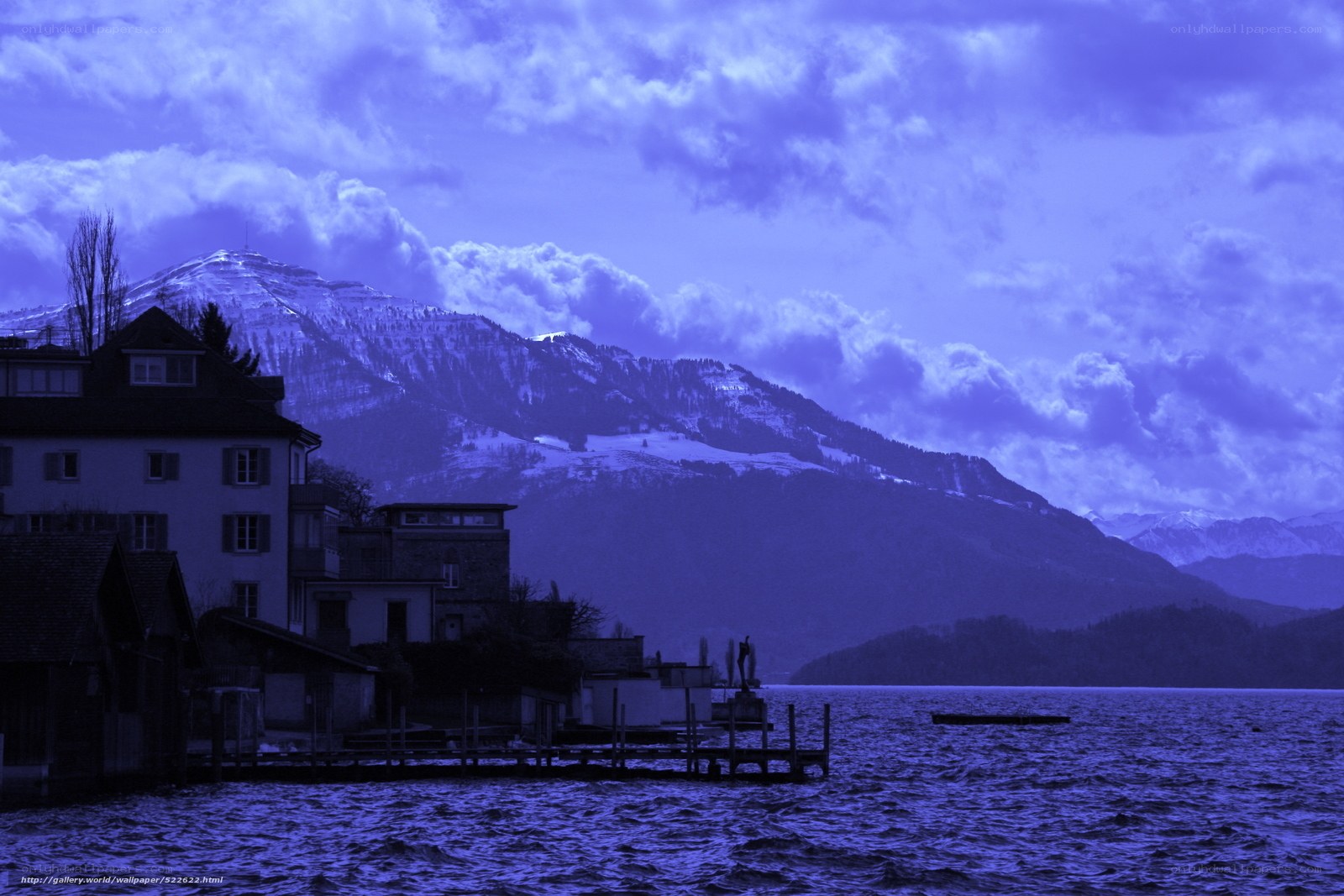 Blue-toned mountain lake scene