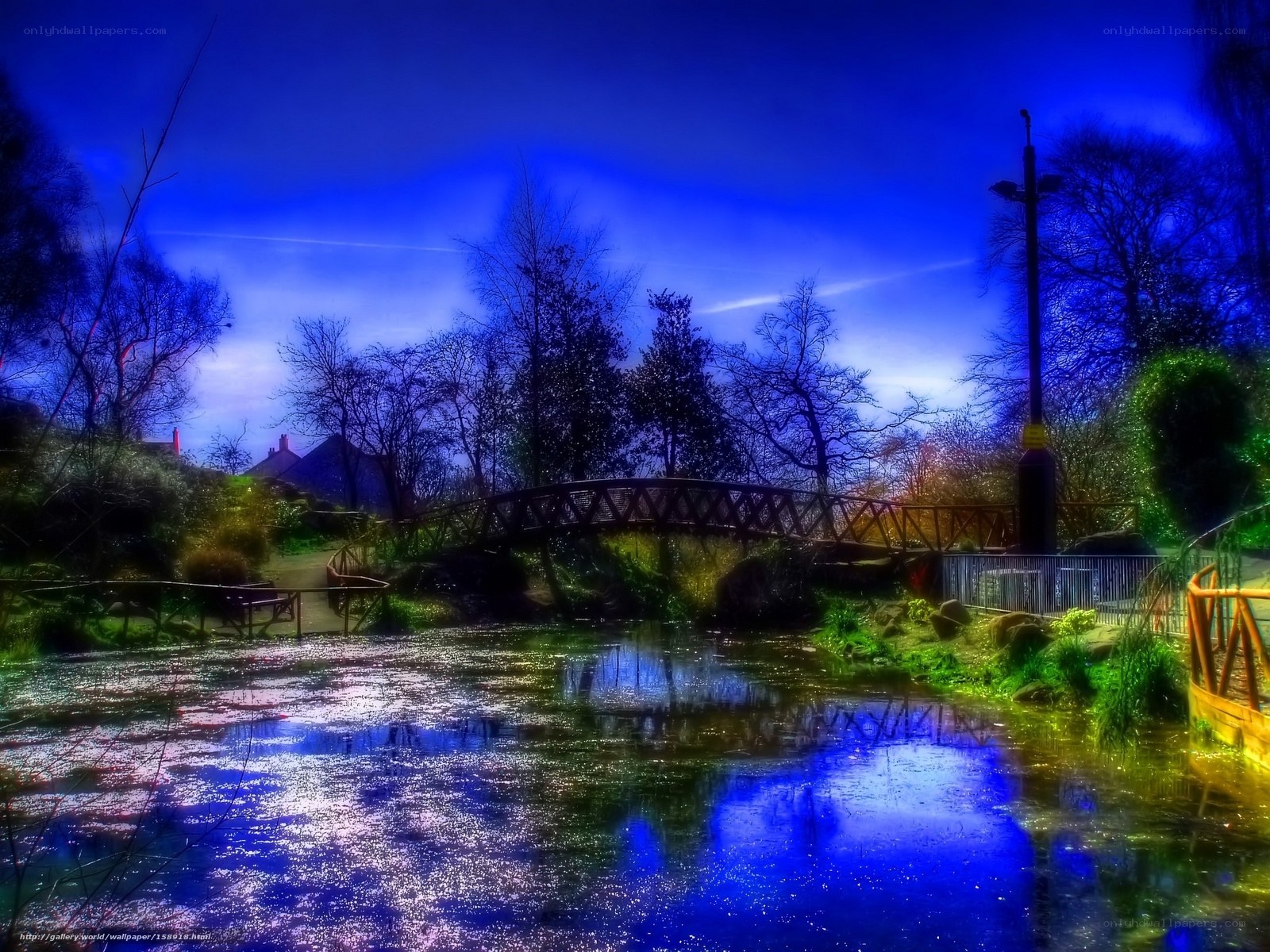 Blue-toned park bridge scene