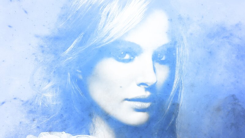 blue-toned portrait of woman