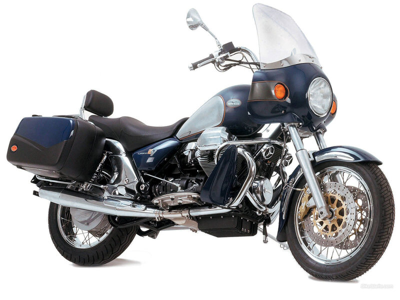 Blue Touring Motorcycle — Chrome Exhaust
