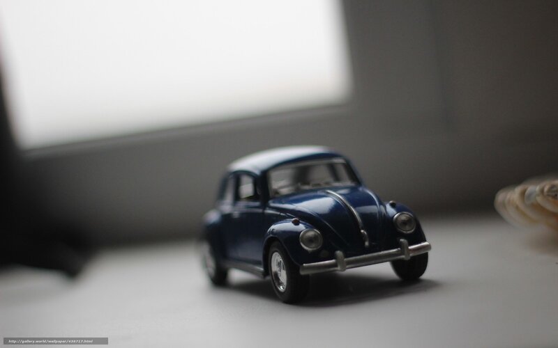 Blue toy car on a surface