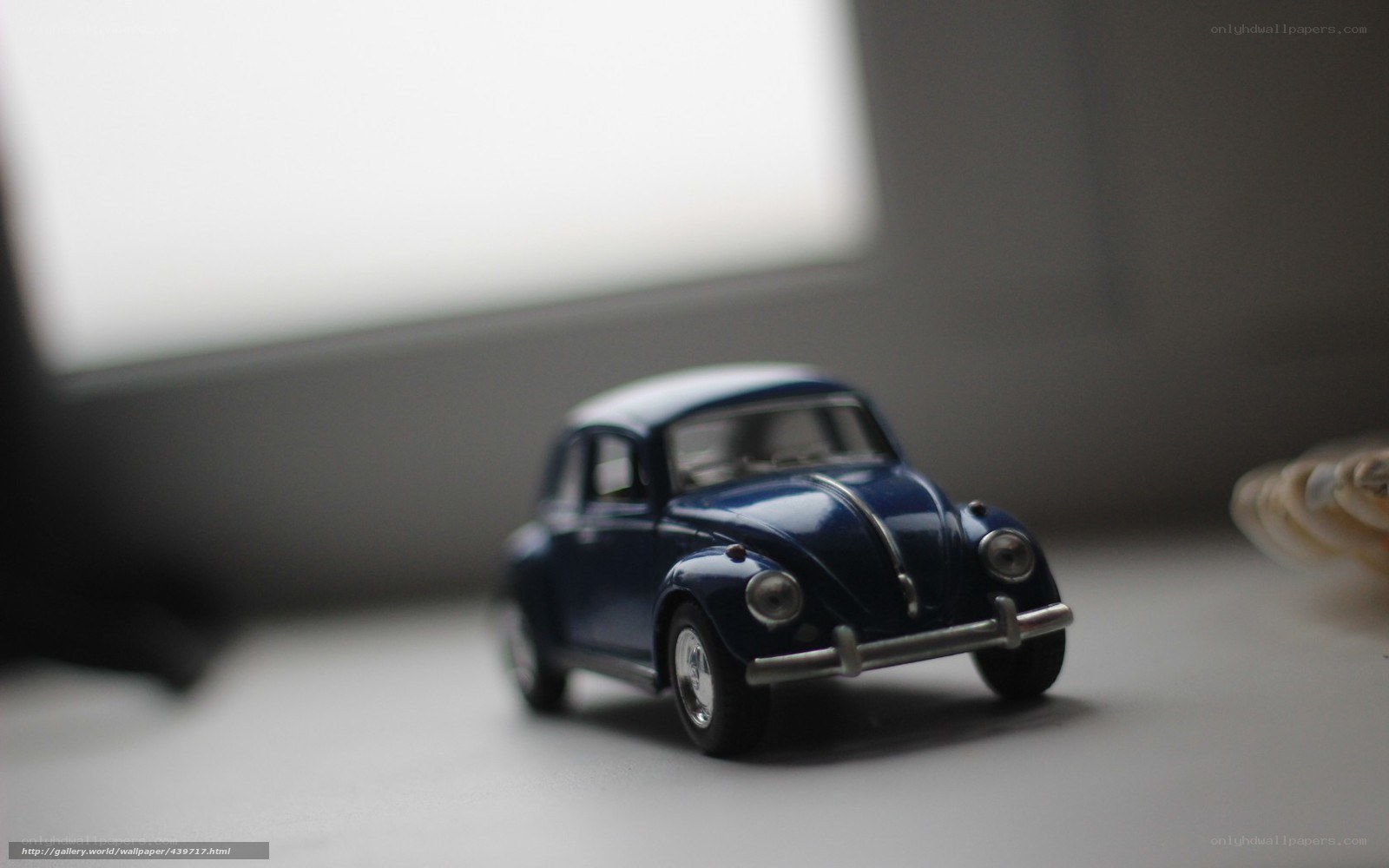 Blue toy car on a surface