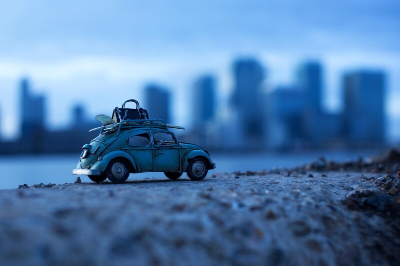 Blue Toy Car on Shore