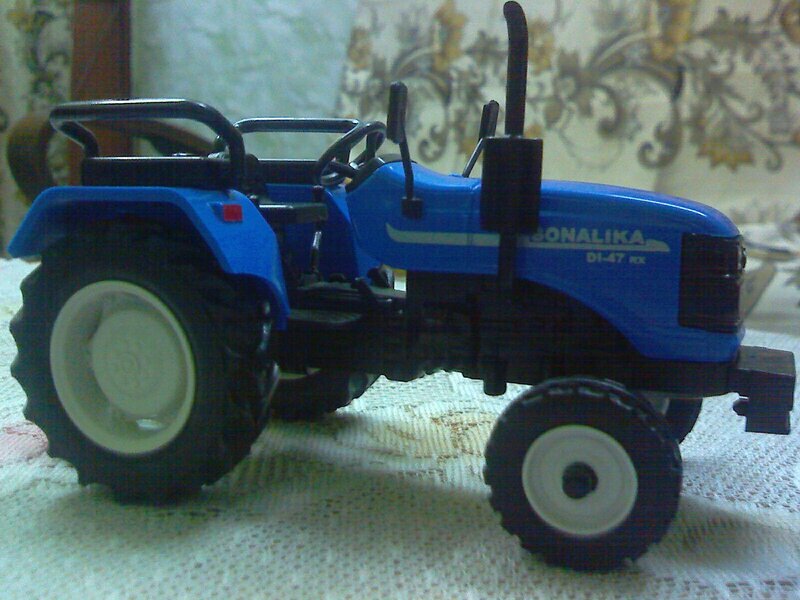blue toy tractor model
