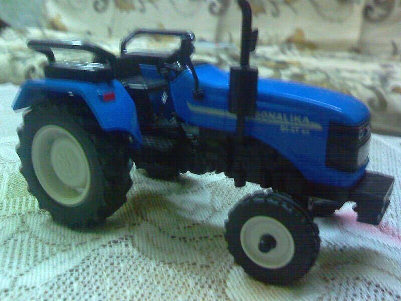 Blue Toy Tractor — Neutral, Photograph