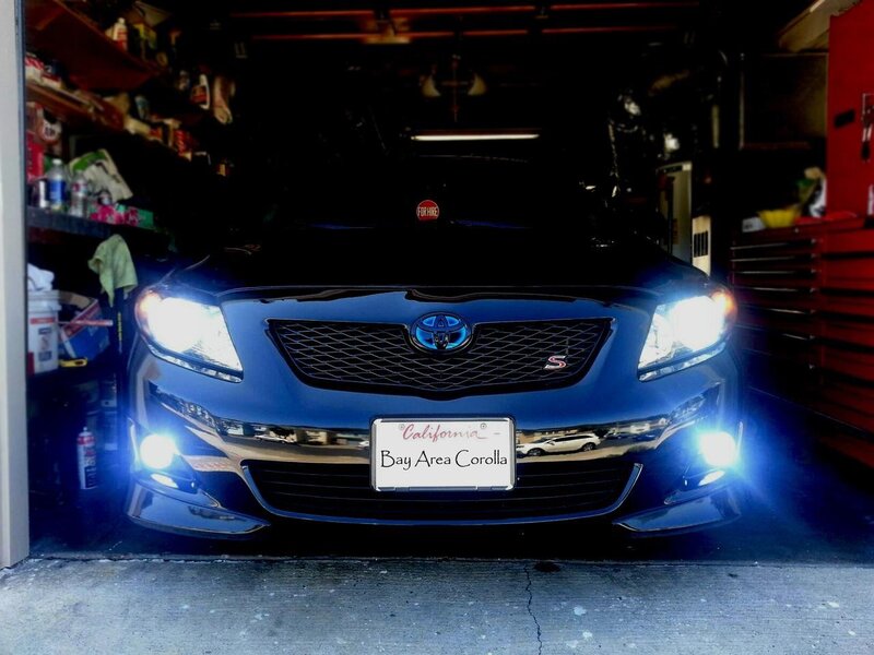 Blue Toyota Corolla in garage