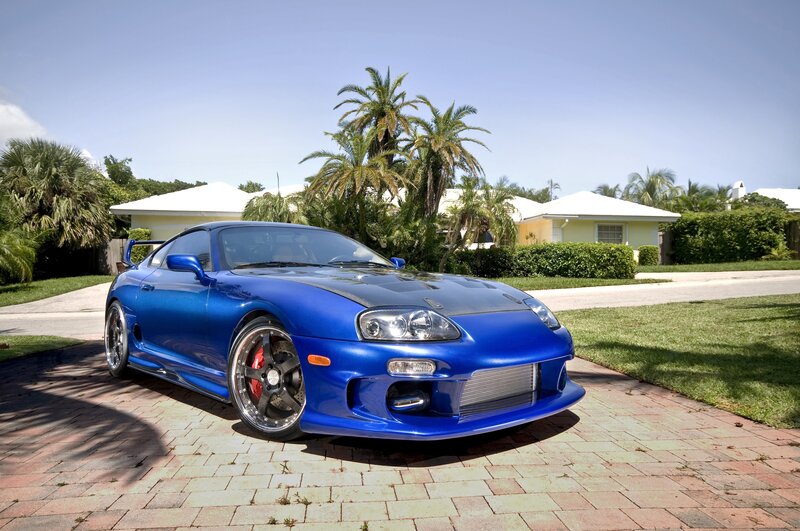Blue Toyota Supra on driveway