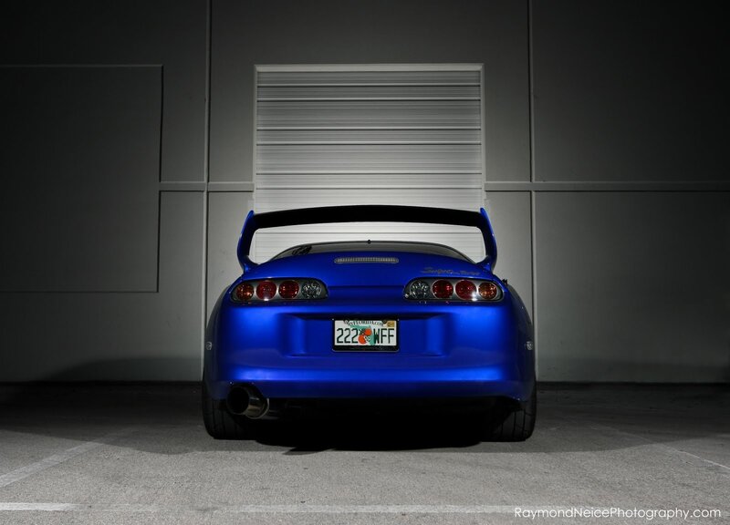 blue toyota supra rear view