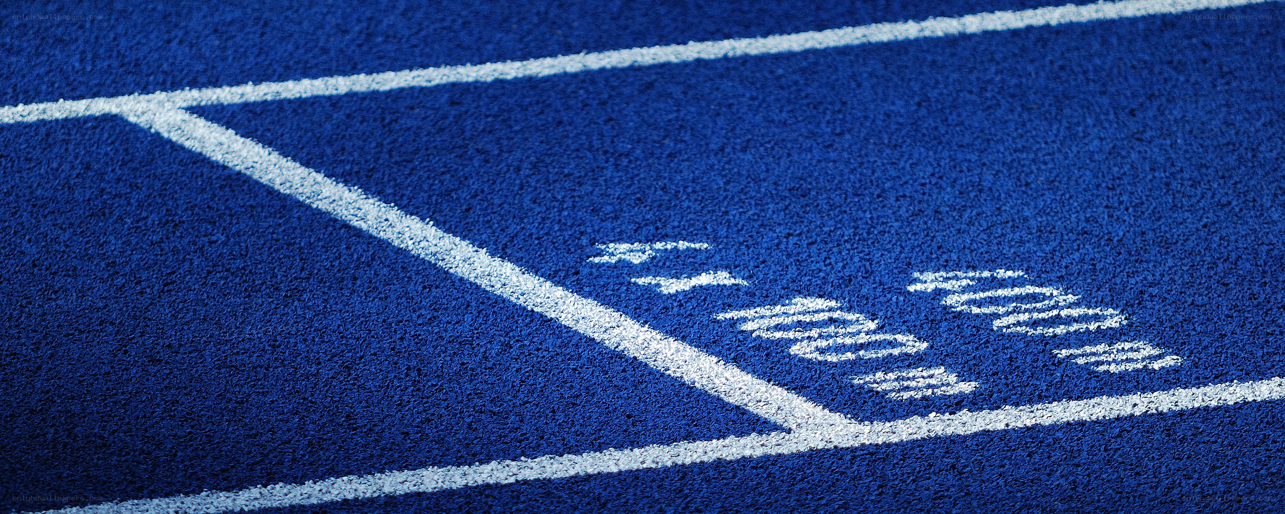 blue track with white lines