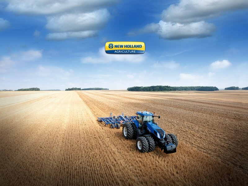 Blue tractor in a field
