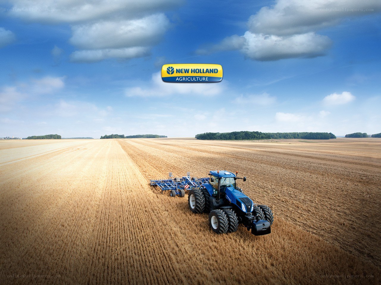 Blue tractor in a field