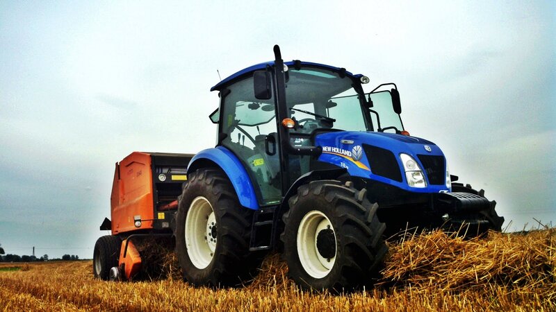Blue Tractor in Field — Rural