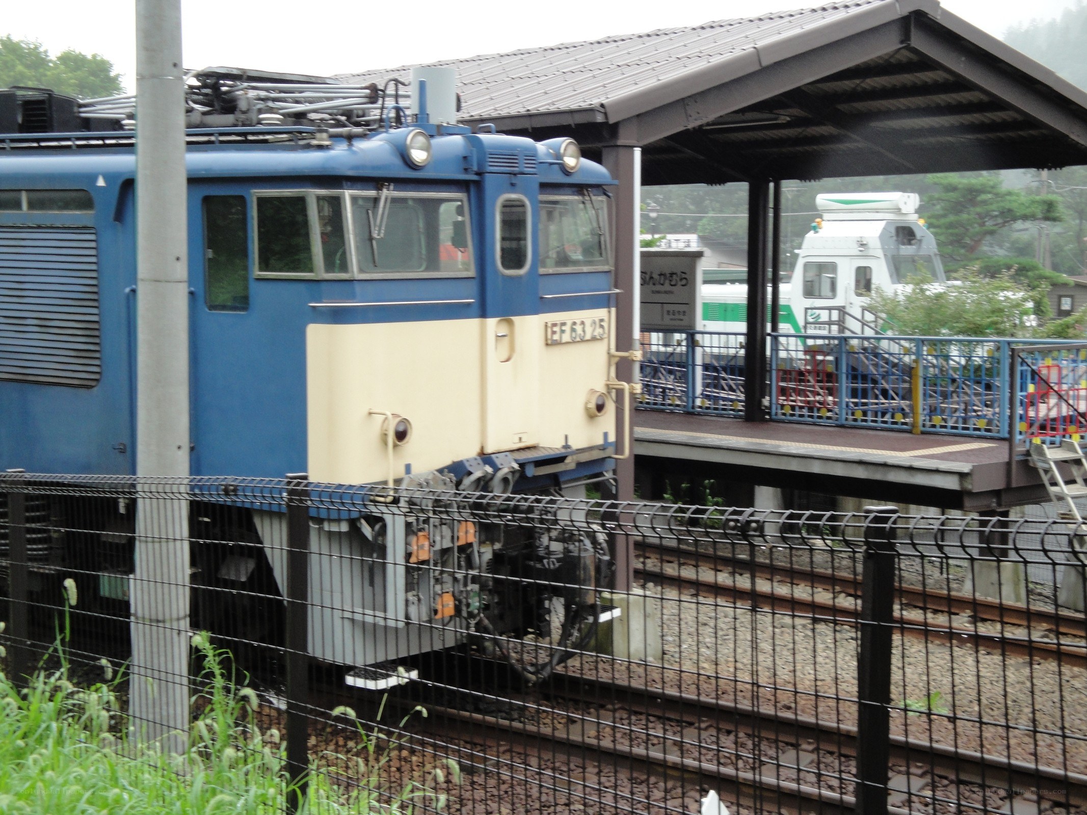 Blue train at a station