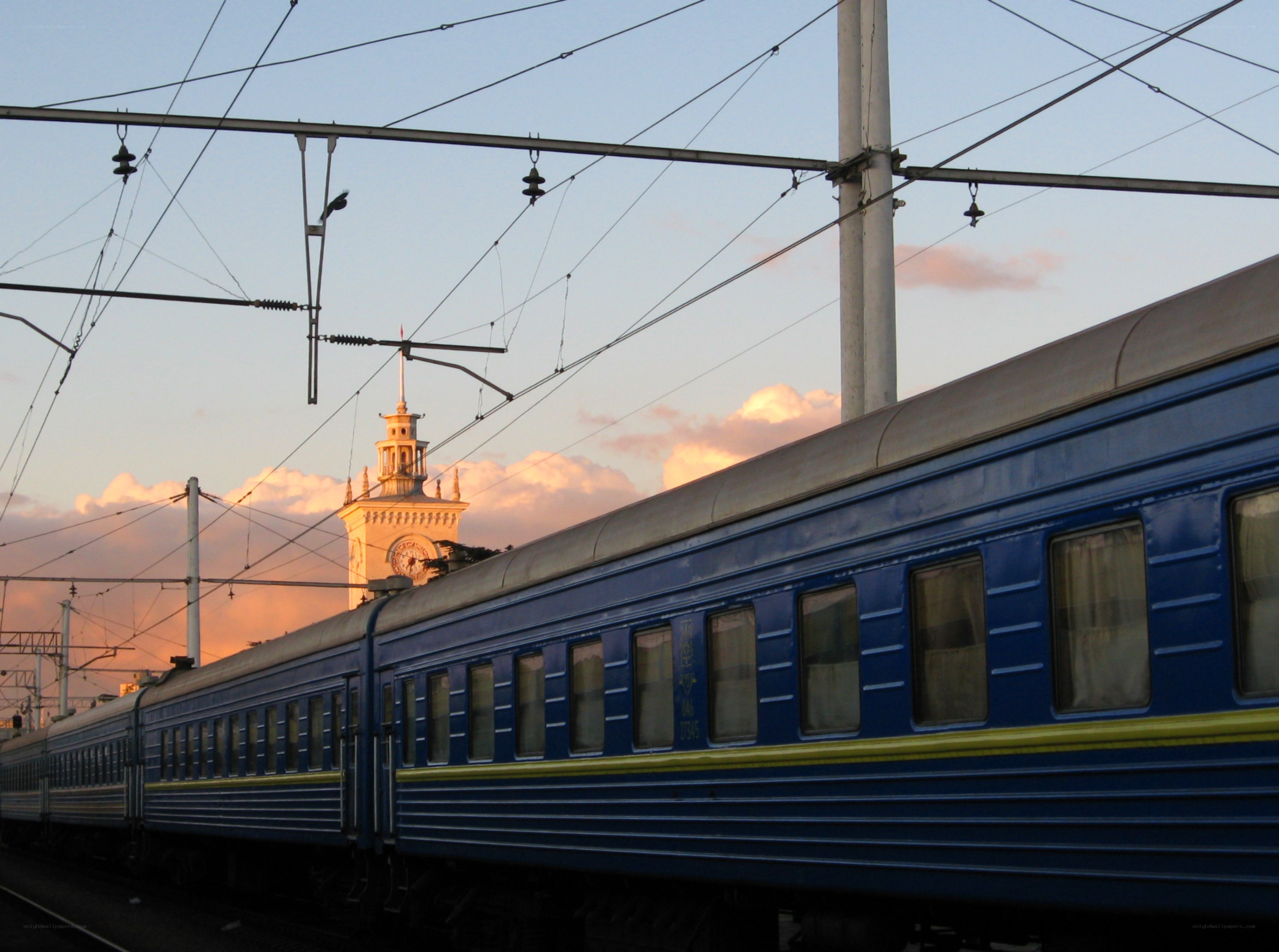 Blue train at sunset