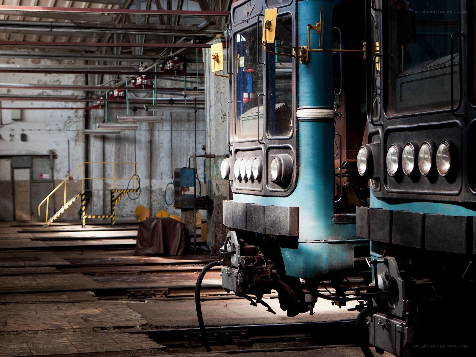 Blue train in maintenance depot