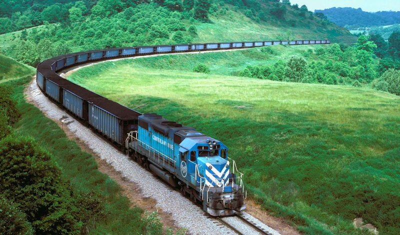 Blue train on a curving track
