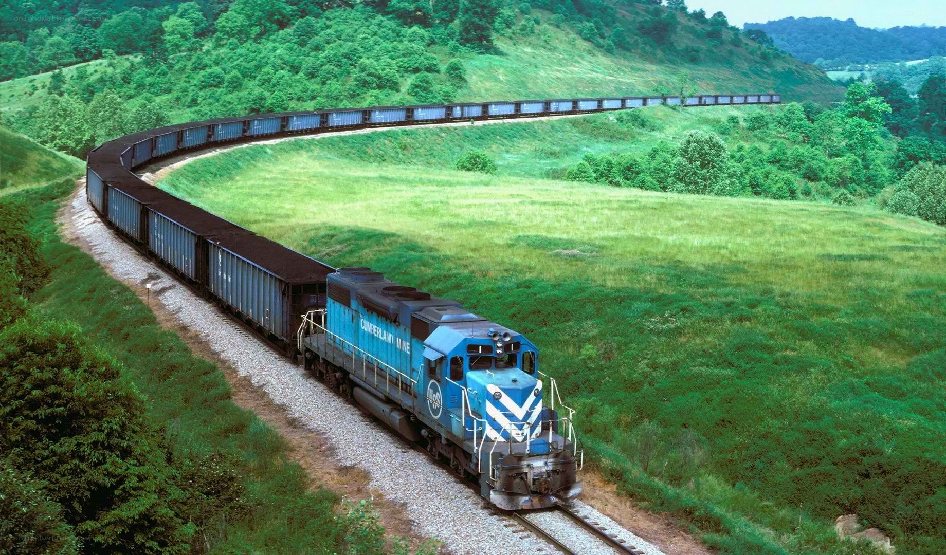 Blue train on a curving track