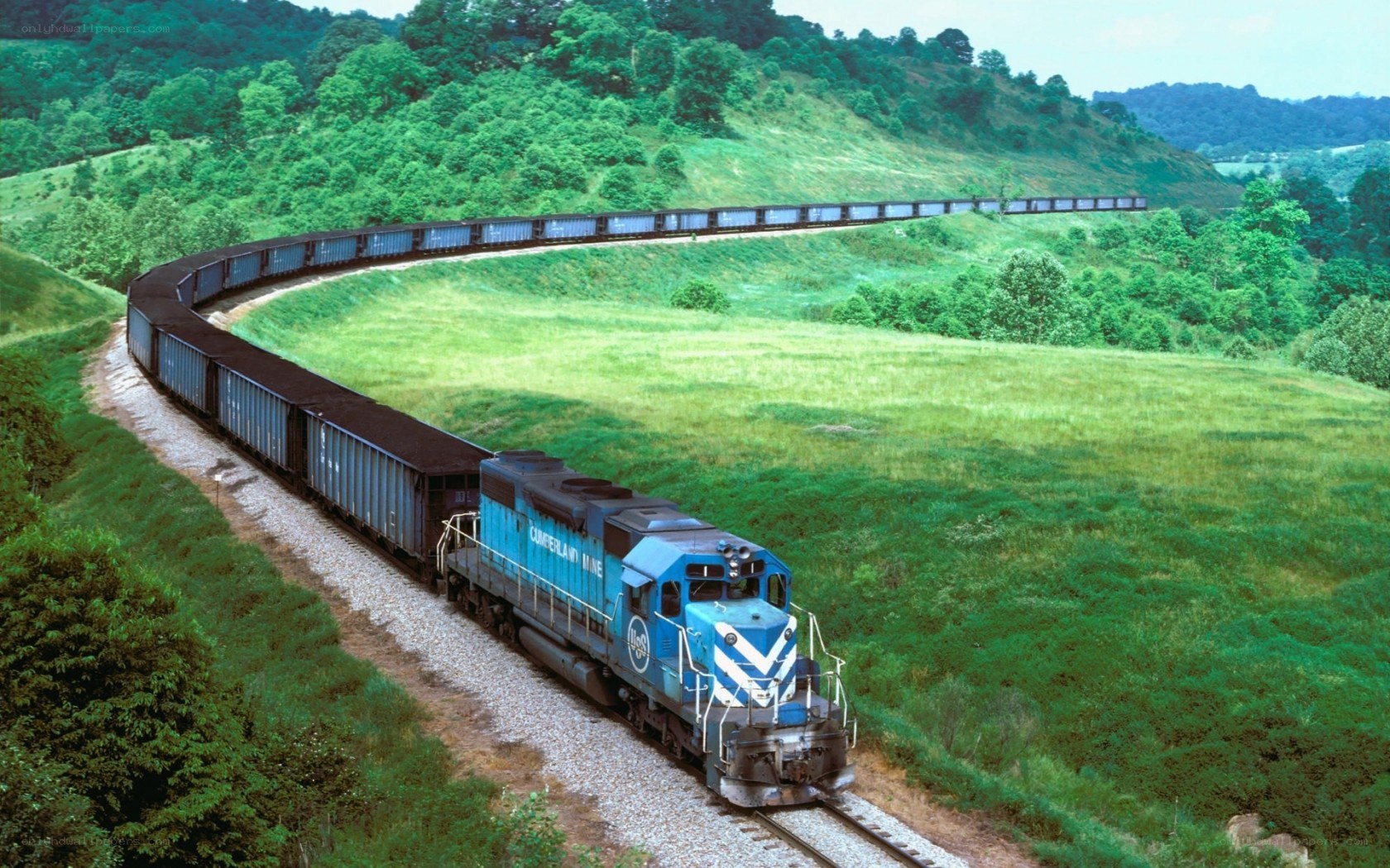 Blue train on a curving track