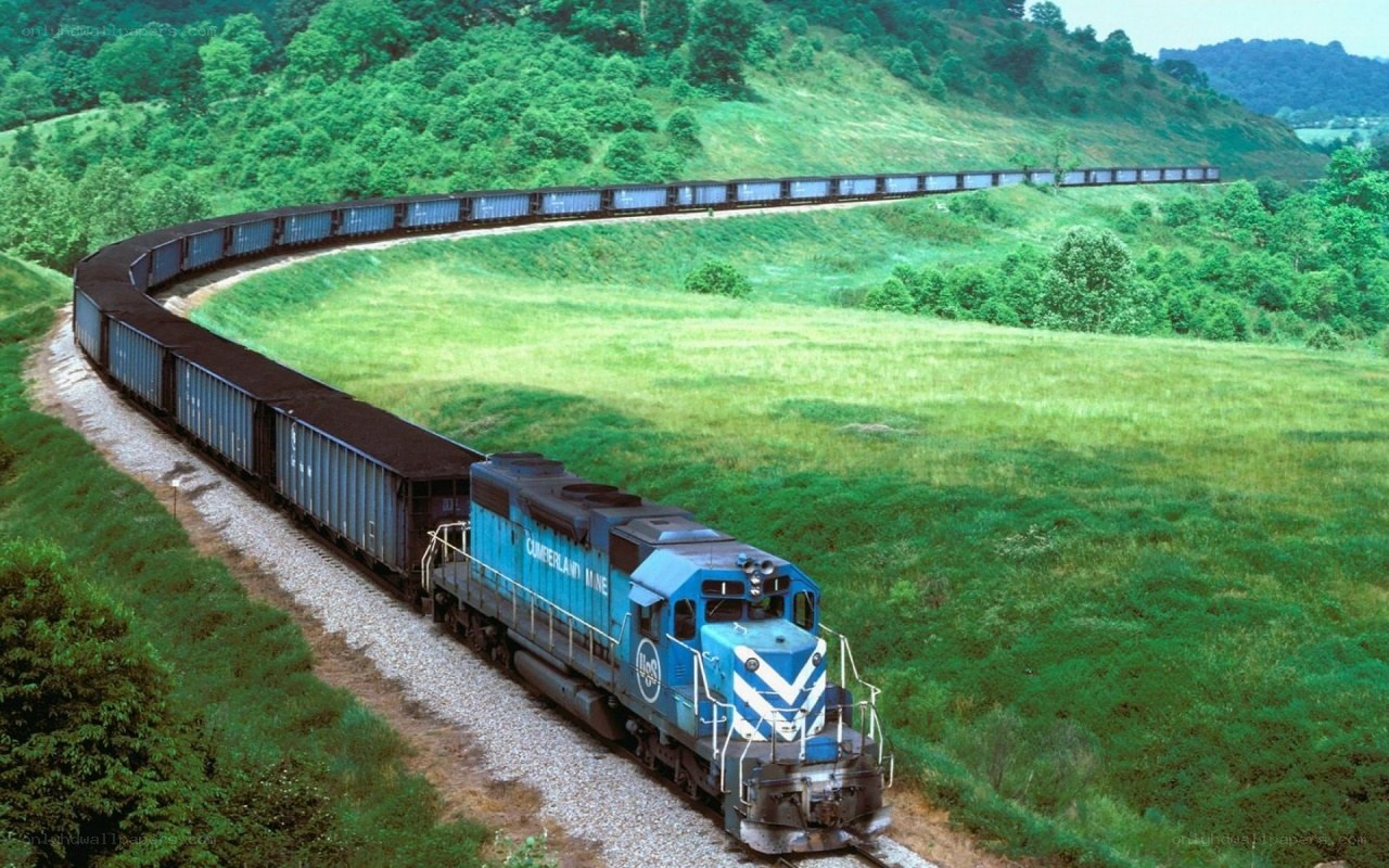 Blue train on a curving track