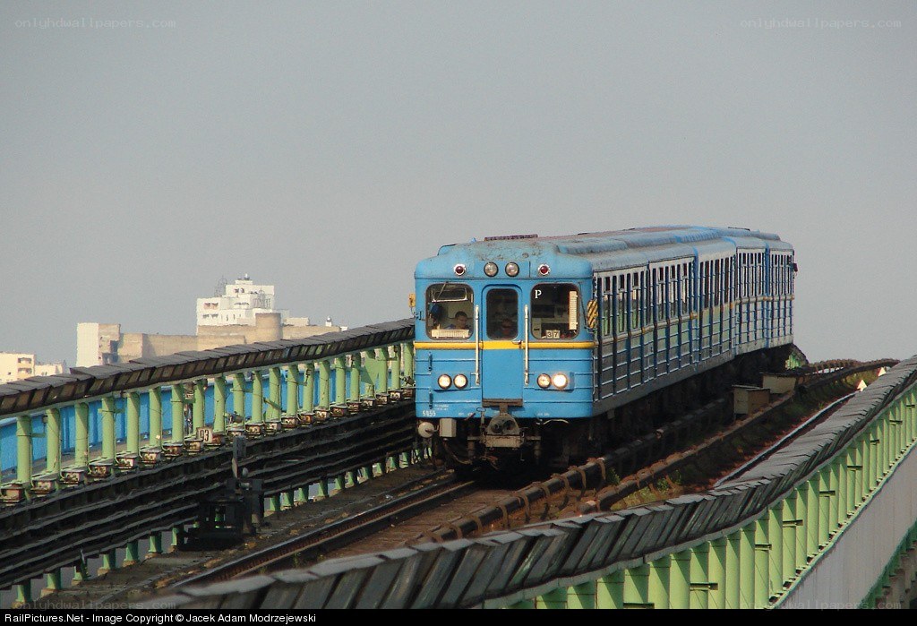 Blue train on elevated track