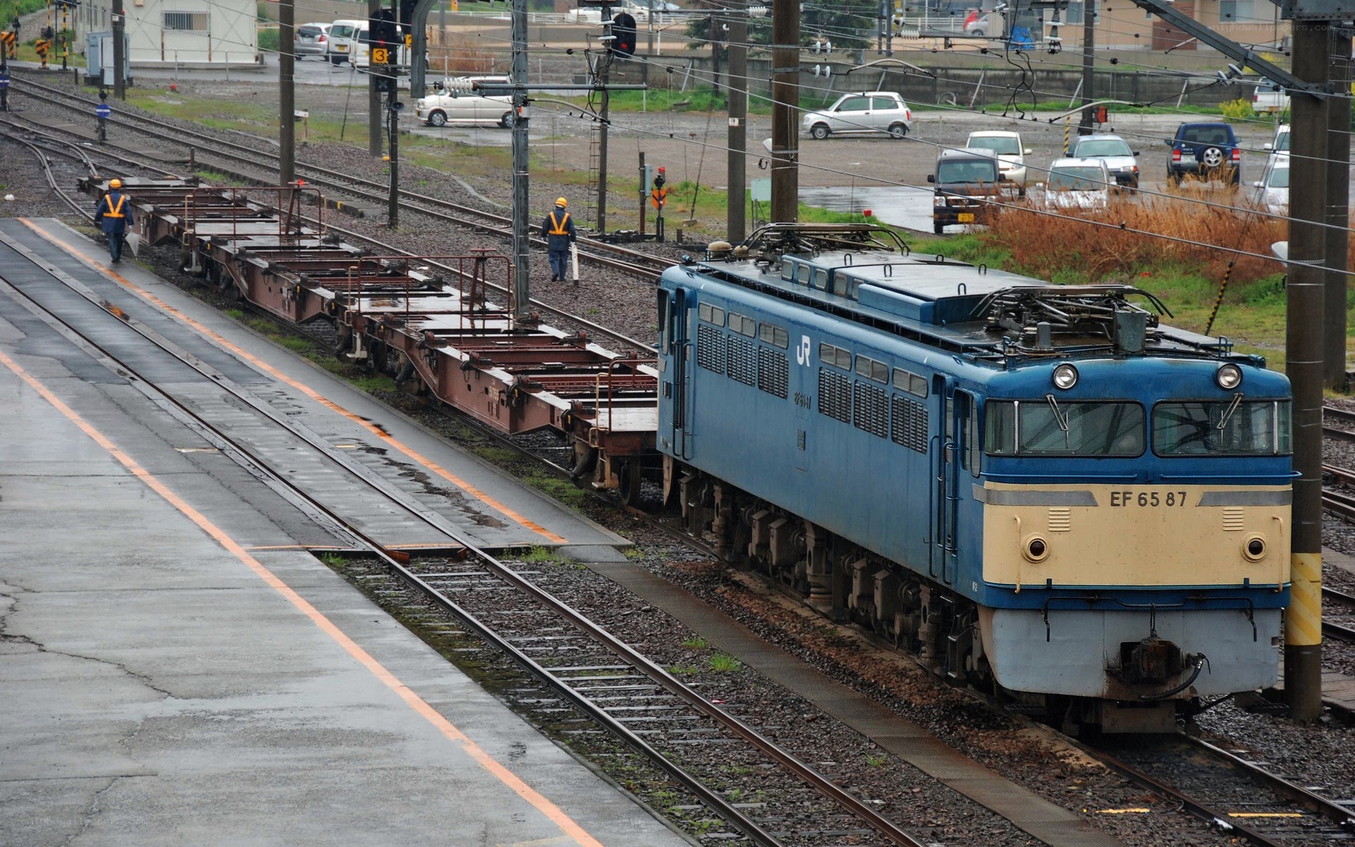 Blue train on railway tracks