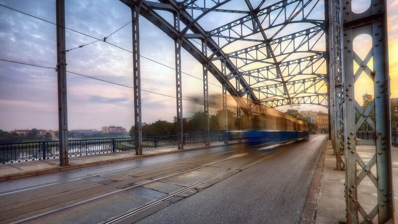 Blue Tram on Bridge — Dramatic